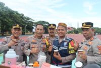 Berbagi Minuman Jahe Gratis, Cara Bripka Ibnu Dengar Keluhan dan Saran Masyarakat