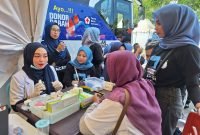 Masyarakat Antusias Donor Darah Dan Pemeriksaan Kesehatan Pada Acara Milenial Aceh Bersama Prabowo- Gibran.
