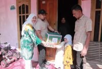 Jelang Idul Fitri, Pj Bupati Aceh Besar Salurkan Bansos untuk Tekon, Lansia, Anak Yatim, dan Fakir Miskin