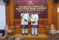 Mendaftar ke KIP Lhokseumawe, Cawalkot Azhari-Zulkarnaen Kenakan Baju Adat Aceh