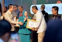 Kadis Kominfo Sumut Terima Penghargaan sebagai Mitra Kerja PKK