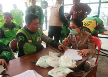 Ratusan Pengemudi Ojek Online Jalani Pemeriksaan Kesehatan Gratis di RS Bhayangkara