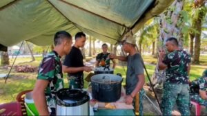 Yonif 115/Macan Leuser Gelar Masak Kuah Beulangong Bersama Warga