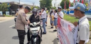 Kapolres Simalungun Wujudkan Semangat Nasionalisme, Gelar Pembagian 2.500 Bendera Merah Putih