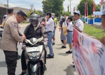 Kapolres Simalungun Wujudkan Semangat Nasionalisme, Gelar Pembagian 2.500 Bendera Merah Putih