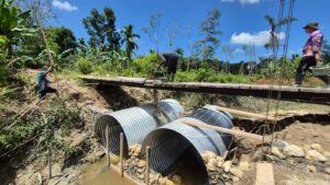 IMG-20260308-WA0008-300x169 Satgas Gulbencal Kodam I/BB Rampungkan Pembangunan Jembatan Aramco di Desa Lalaona’a