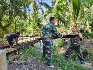 Kodim 0212/TS Bersama Warga Mulai Bangun Jembatan Gantung di Padang Bolak Julu