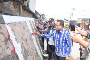 Sentuhan Mural Kreatif Warnai Penataan Kawasan Kumuh di Percut Menuju Deli Serdang Maju