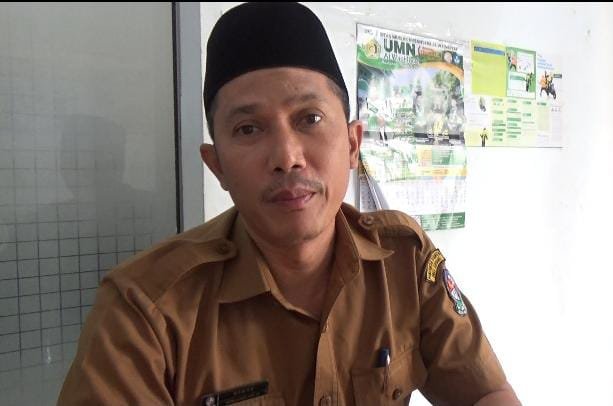 Kepala Desa Amplas, Usman. (Dok. Ist)
