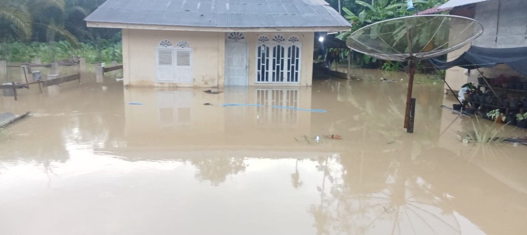 Salah satu rumah warga yang terendam oleh banjir. (Dok. BPBD Nagan Raya)
